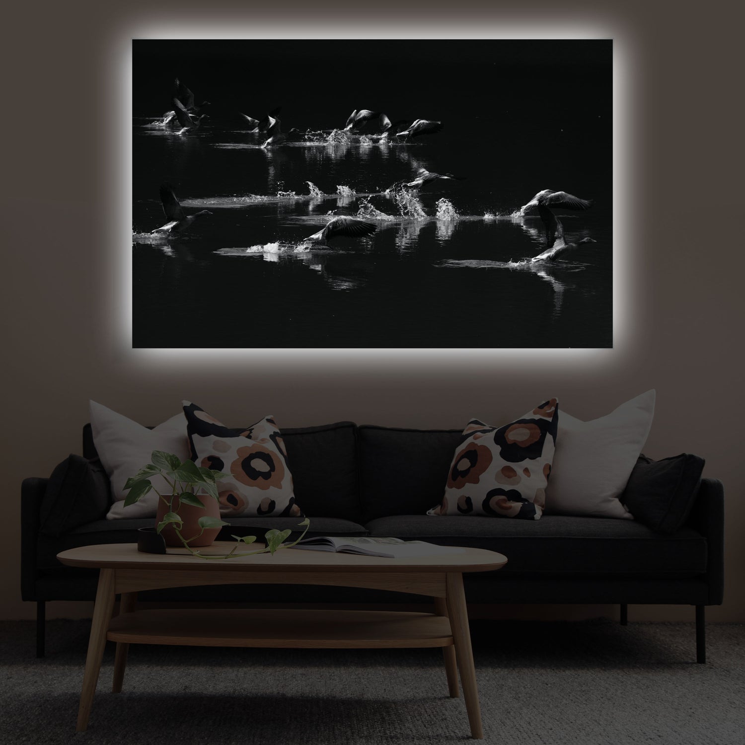 Startende Enten auf einem See Wandbild